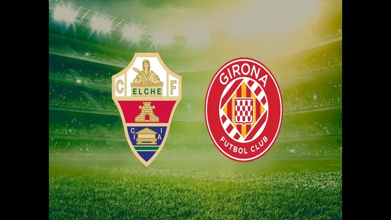 Cầu thủ Elche vượt qua cầu thủ Girona bằng kỹ thuật đi bóng tinh tế.